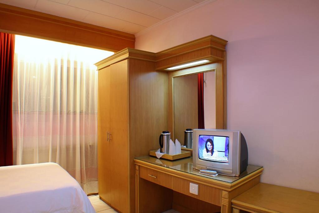 TV a/nebo společenská místnost v ubytování Hotel Hangtuah