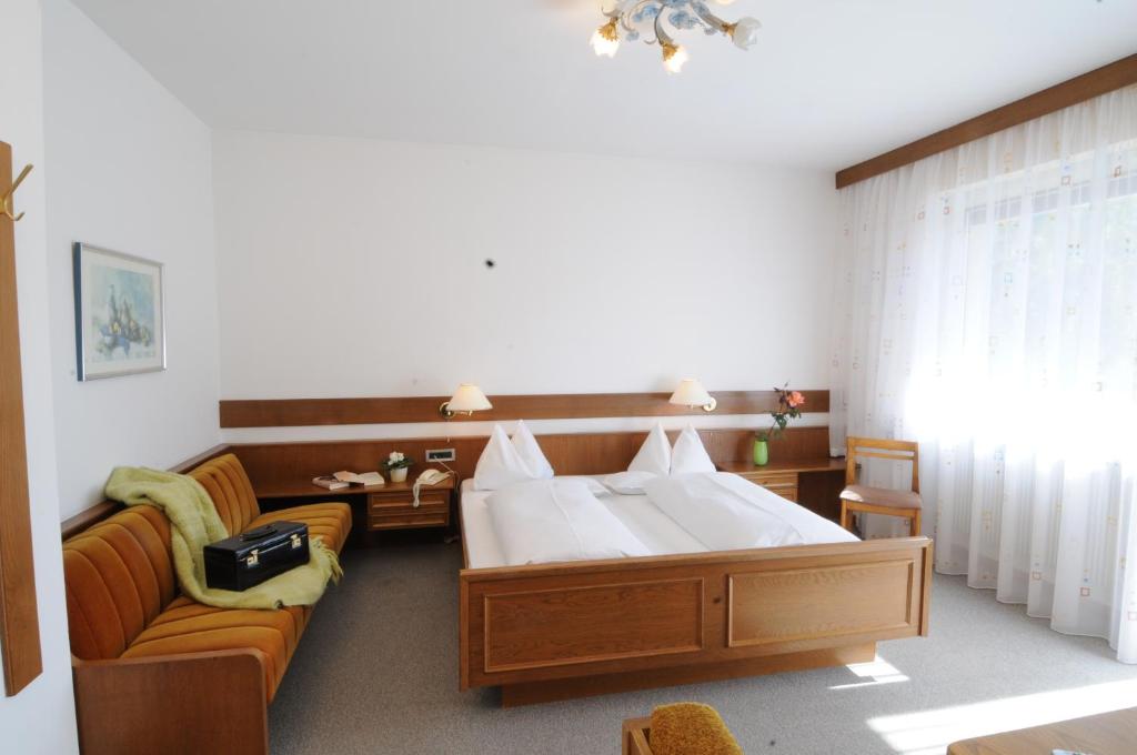 Postel nebo postele na pokoji v ubytování Garni Weingut
