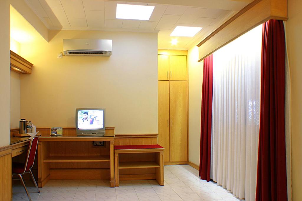 TV a/nebo společenská místnost v ubytování Hotel Hangtuah