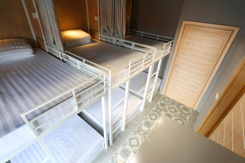 Postel nebo postele na pokoji v ubytování RS II Guesthouse
