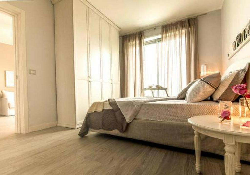 Postel nebo postele na pokoji v ubytování Residence Modus Vivendi