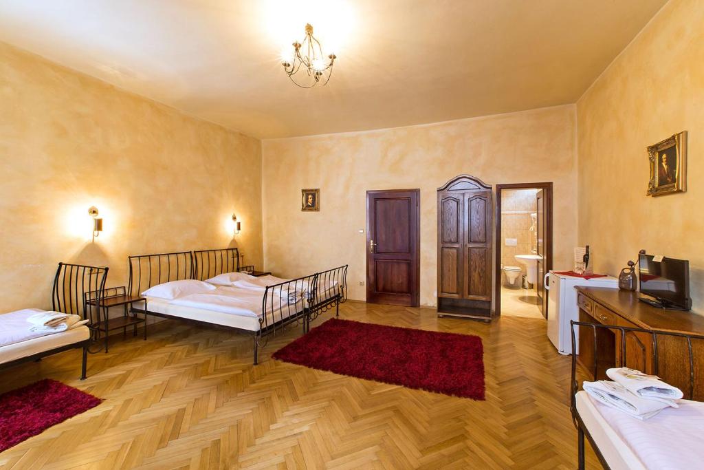 Postel nebo postele na pokoji v ubytování Arcadie Hotel & Apartments