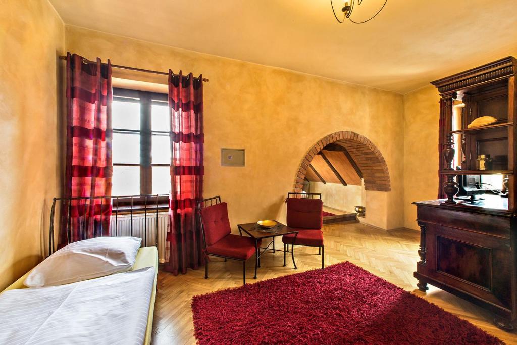 Postel nebo postele na pokoji v ubytování Arcadie Hotel & Apartments