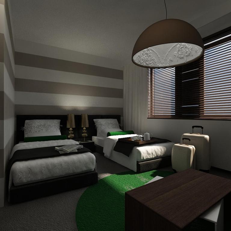 Postel nebo postele na pokoji v ubytování Hotel Symfonia Osjaków