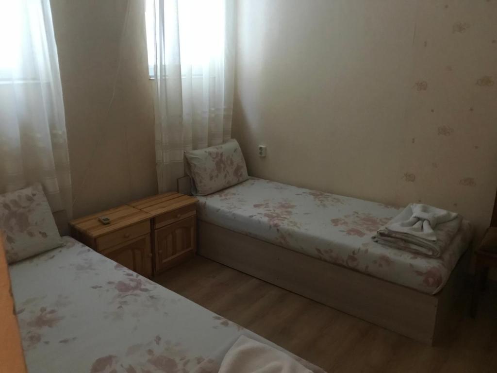Postel nebo postele na pokoji v ubytování Family Hotel - Relax