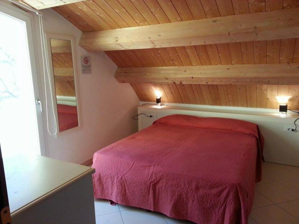 Postel nebo postele na pokoji v ubytování Hotel Lara