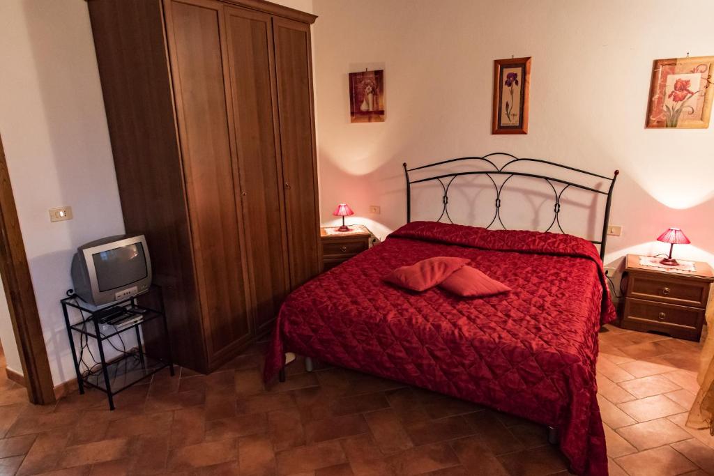 Posteľ alebo postele v izbe v ubytovaní La Sorgente del Radicino