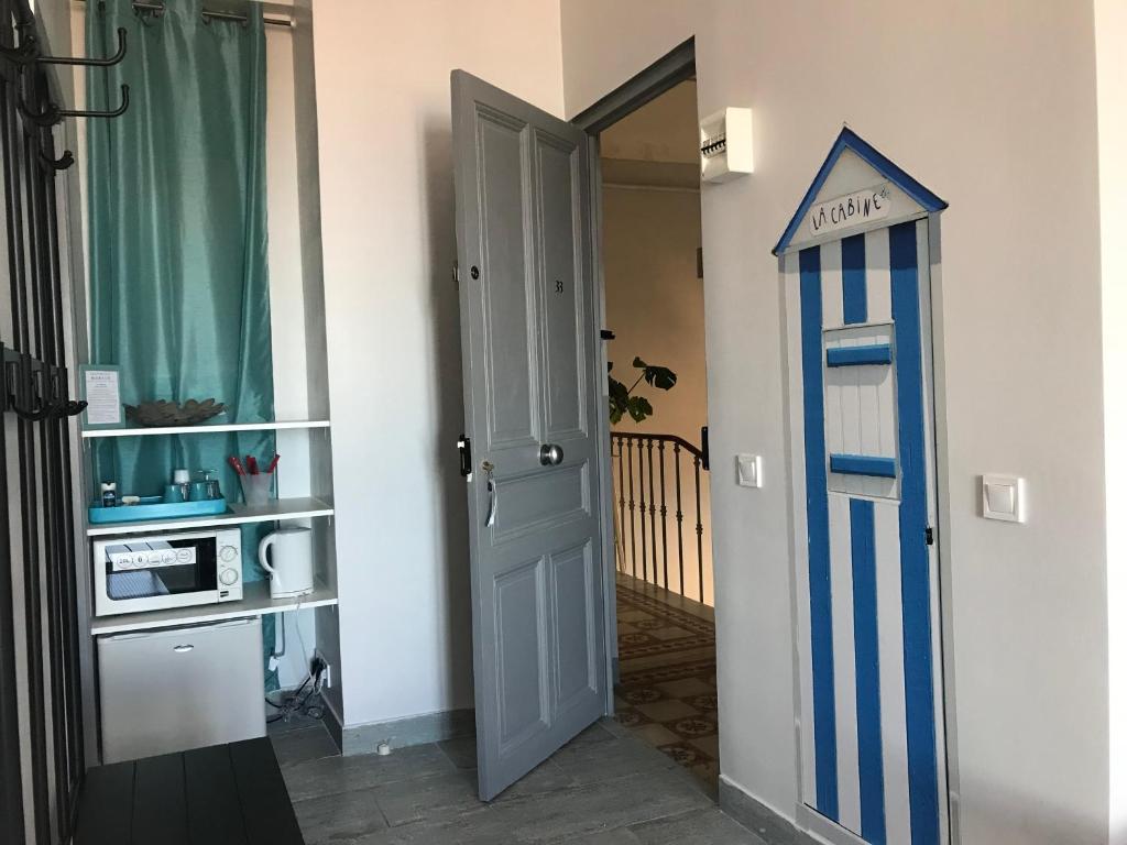 Kuchyň nebo kuchyňský kout v ubytování Apartments Monaco