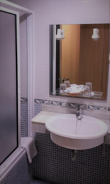 Koupelna v ubytování Hotel Anfora