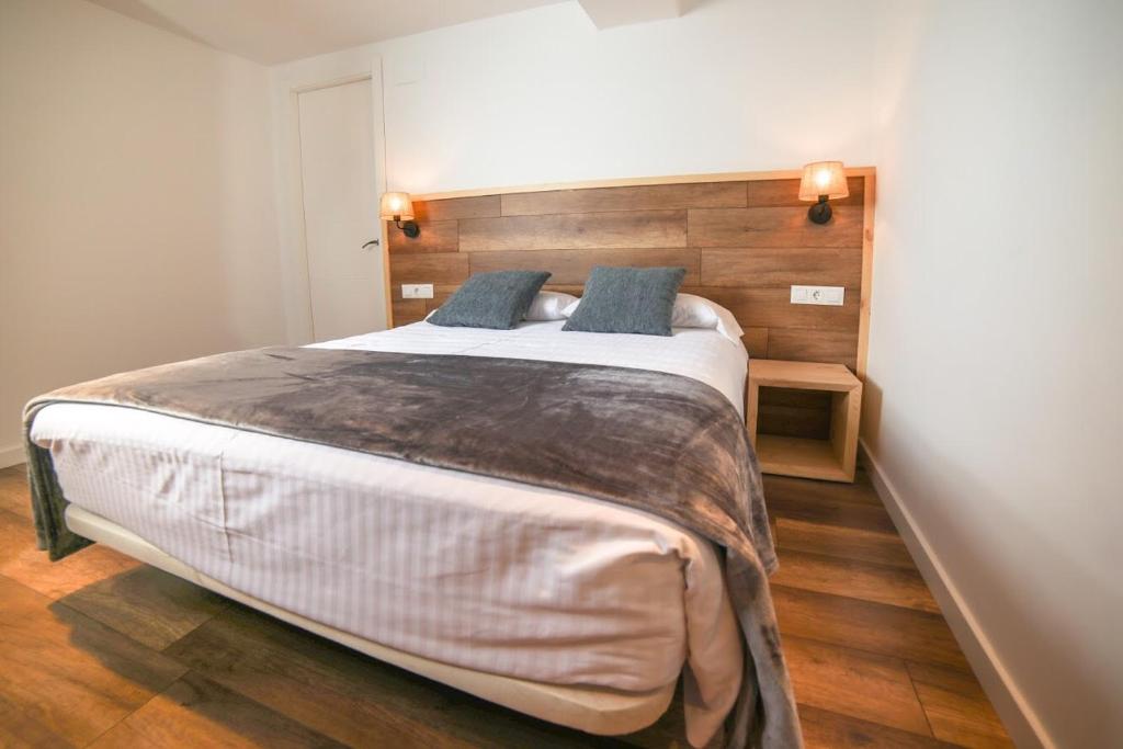 Postel nebo postele na pokoji v ubytování Hotel Roca