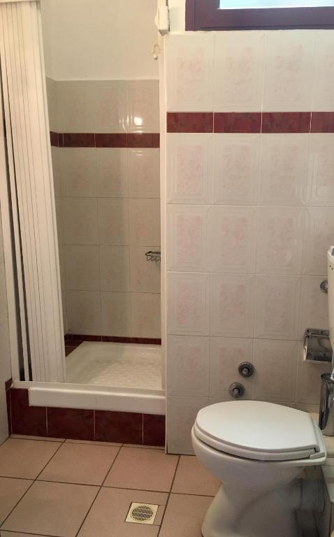 Koupelna v ubytování Hotel Olympion