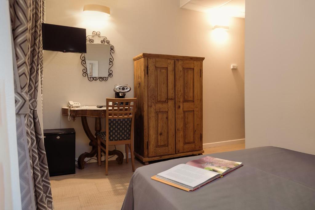 Postel nebo postele na pokoji v ubytování Albergo Al Viale