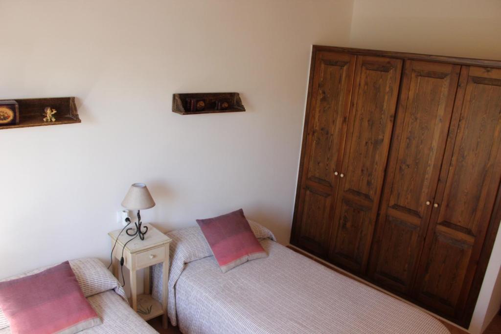 Posteľ alebo postele v izbe v ubytovaní Casa con jardín y piscina - MORELL ONZE