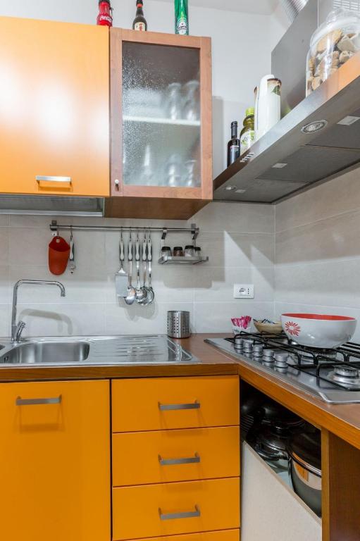 Kuchyň nebo kuchyňský kout v ubytování Calabernardo Home Malacala