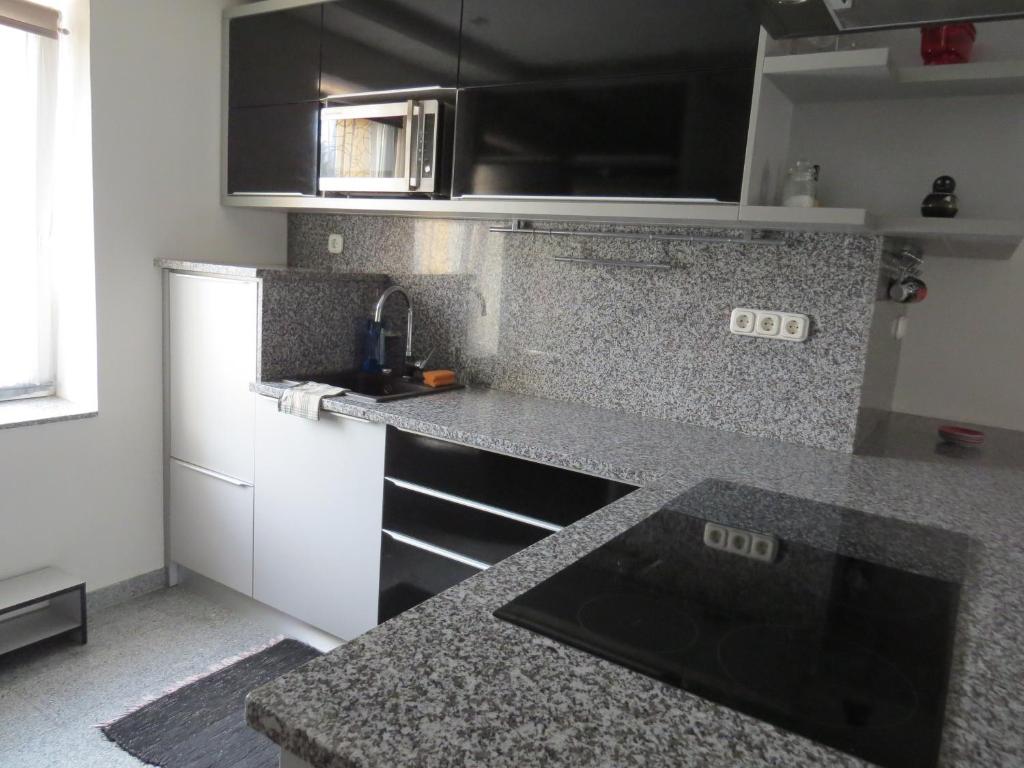 Kuchyňa alebo kuchynka v ubytovaní Aranyhal apartman
