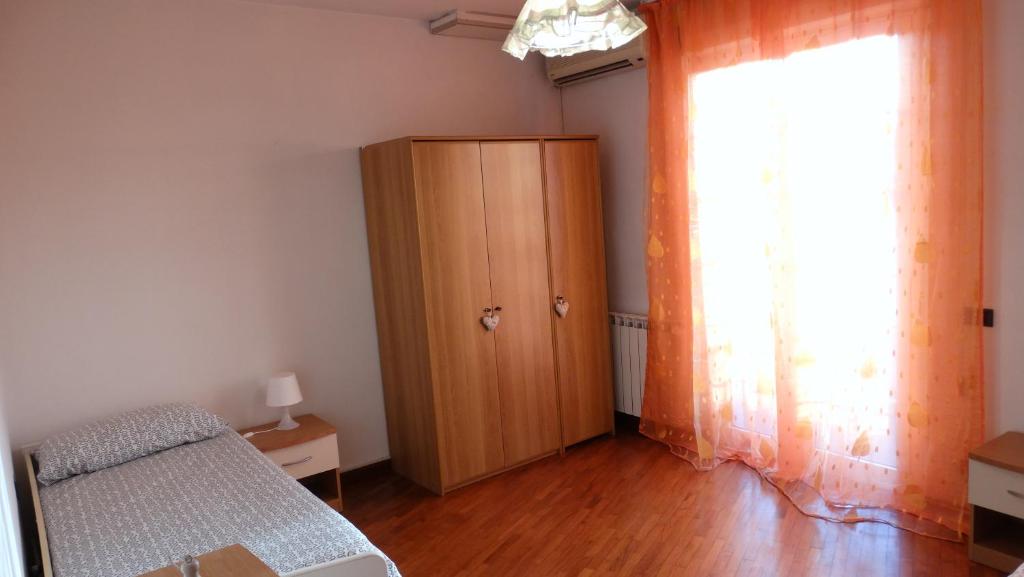 Posteľ alebo postele v izbe v ubytovaní SUPERCASONA pratica