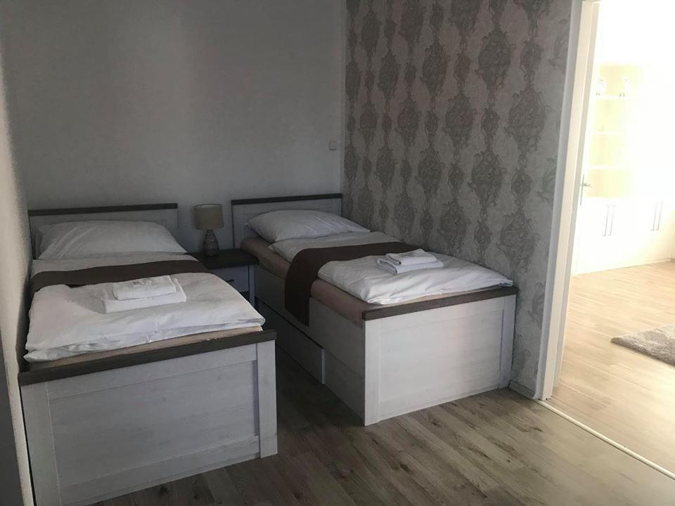 Voodi või voodid majutusasutuse Ubytování Cukrovar toas