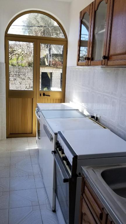 Kuchyň nebo kuchyňský kout v ubytování Guesthouse Kodre