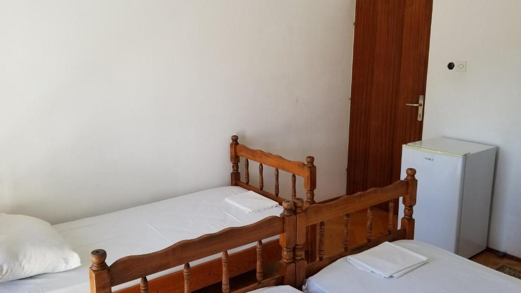 Postel nebo postele na pokoji v ubytování Guesthouse Kodre