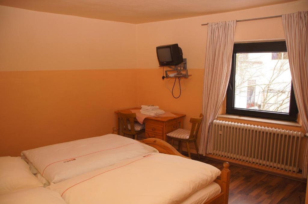 Postel nebo postele na pokoji v ubytování Hotel Paseo