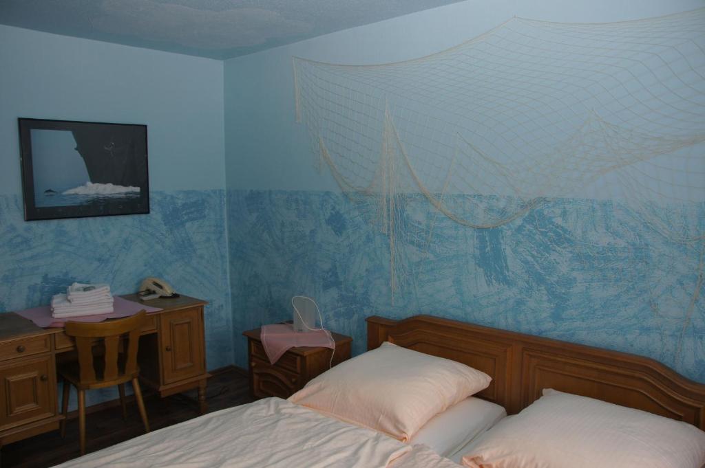 Postel nebo postele na pokoji v ubytování Hotel Paseo