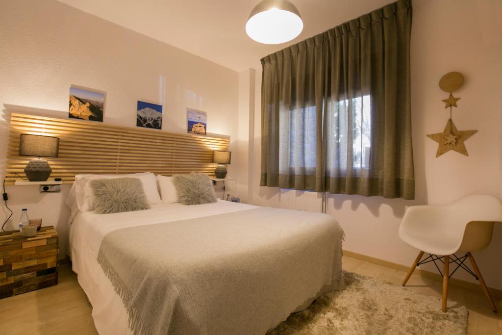 Postel nebo postele na pokoji v ubytování B&B La Lluna