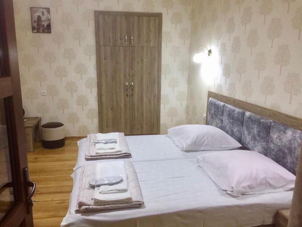 Postel nebo postele na pokoji v ubytování Guest House Rafael