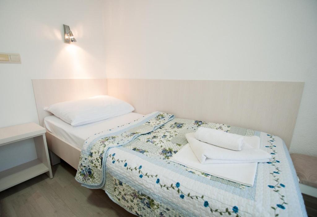 Postel nebo postele na pokoji v ubytování Pansion Obala