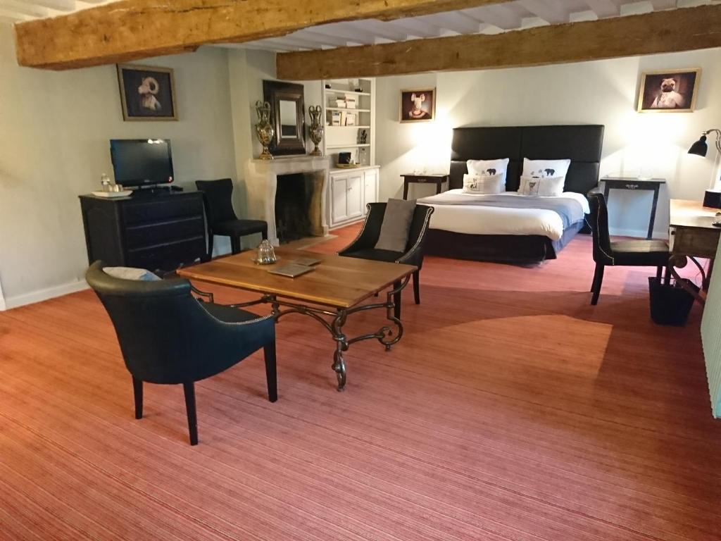 Postel nebo postele na pokoji v ubytování Côté Jardin - Chambres d'hôtes