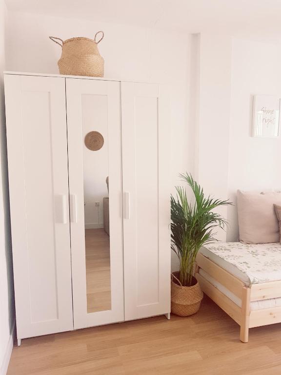 Łóżko lub łóżka w pokoju w obiekcie Estudio Pueblo Evita 133