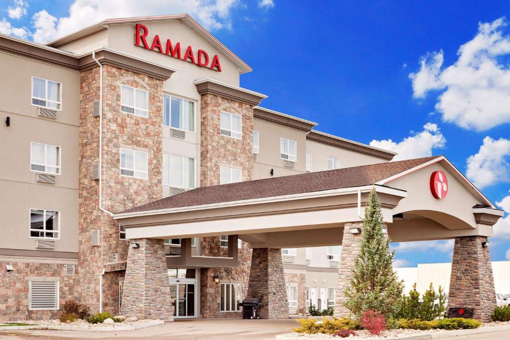 a rendering of the front of a hotel at Ramada by Wyndham Stettler in Stettler