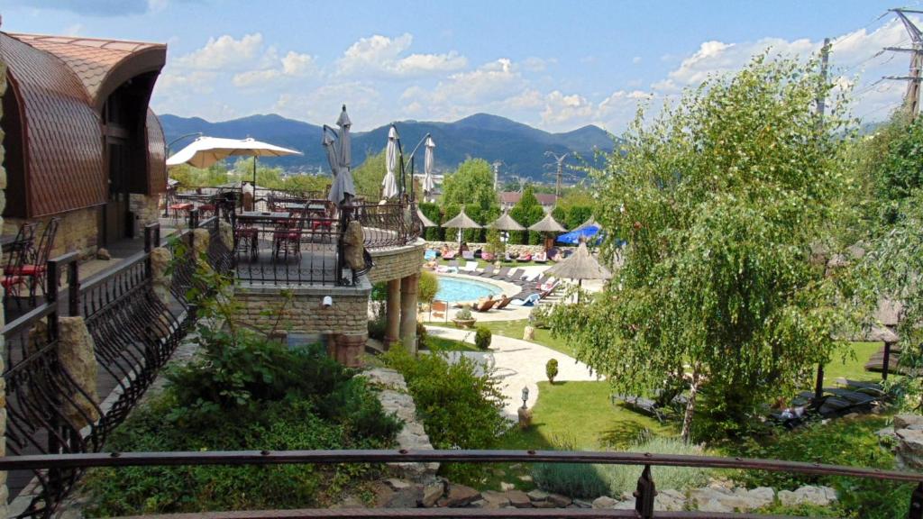 a view of a resort with a swimming pool at Castel Transilvania in Baia Mare