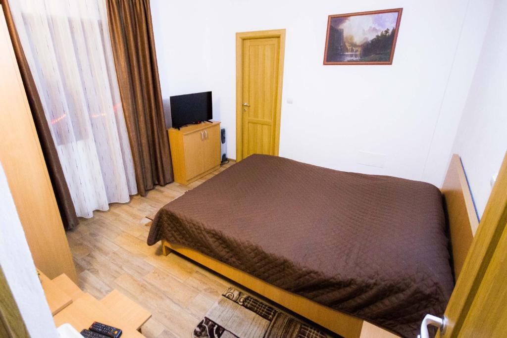 Postel nebo postele na pokoji v ubytování Vidra Parc