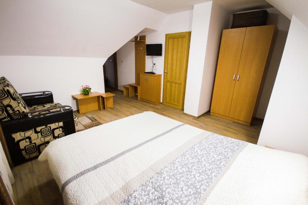Postel nebo postele na pokoji v ubytování Vidra Parc