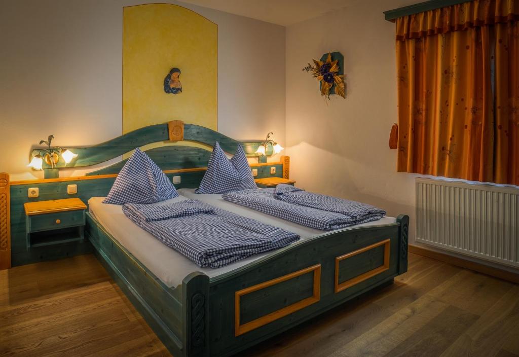 Postel nebo postele na pokoji v ubytování Familienhotel Hochrieß