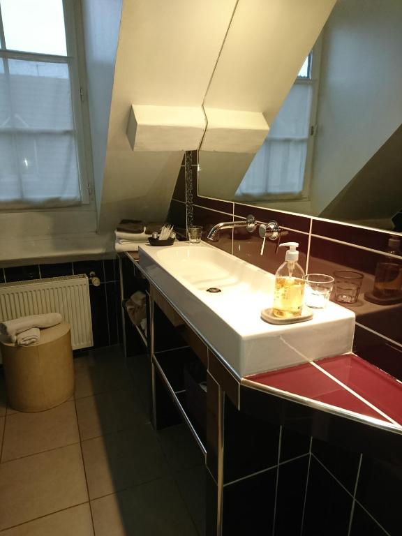 Koupelna v ubytování Côté Jardin - Chambres d'hôtes