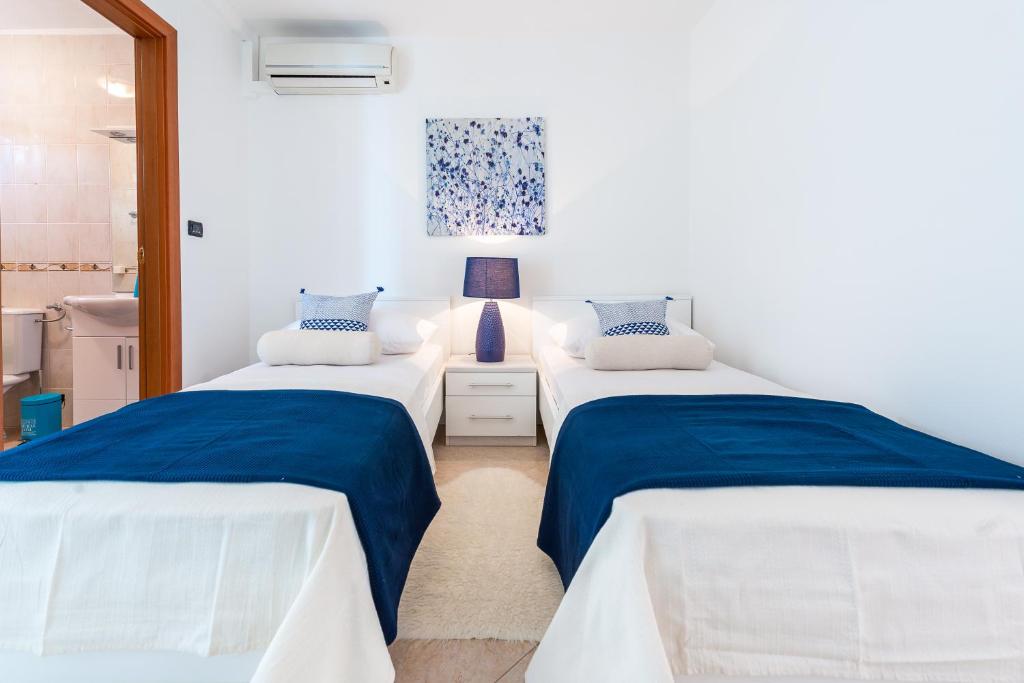 Posteľ alebo postele v izbe v ubytovaní Dream Estate