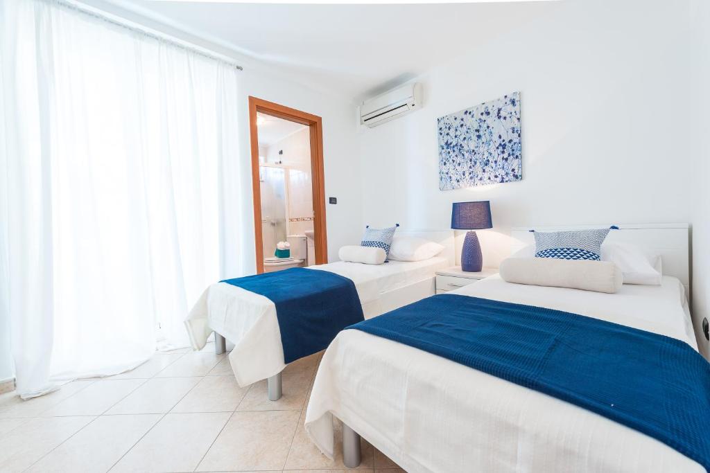 Posteľ alebo postele v izbe v ubytovaní Dream Estate