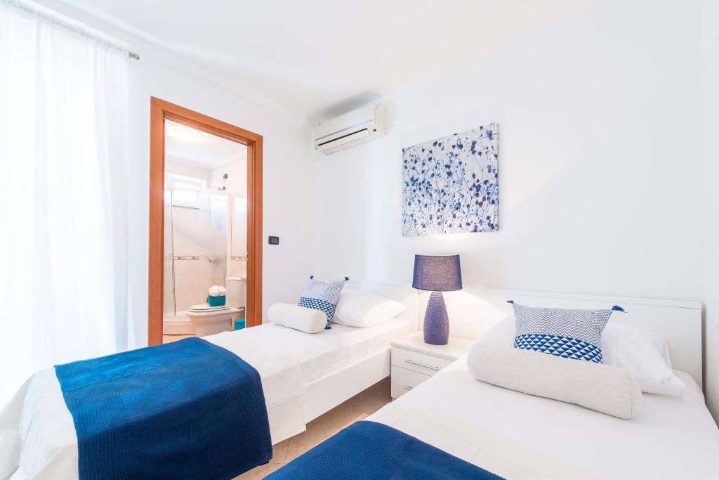 Posteľ alebo postele v izbe v ubytovaní Dream Estate