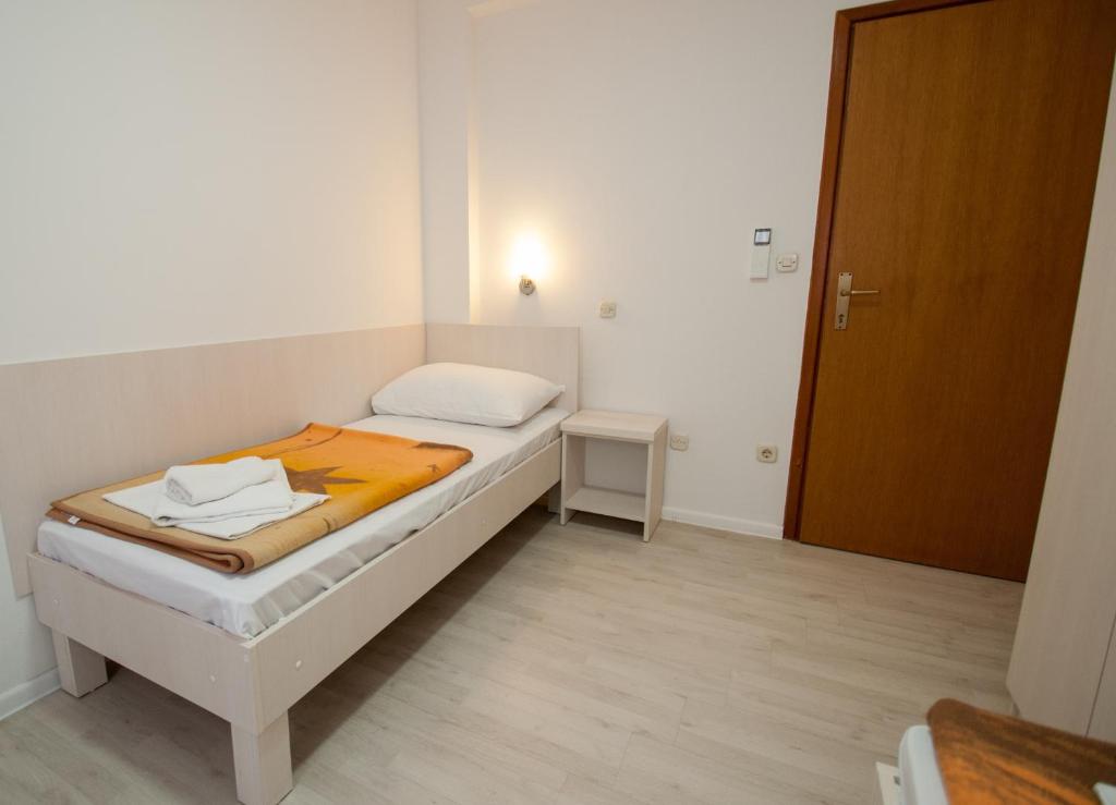 Postel nebo postele na pokoji v ubytování Pansion Obala