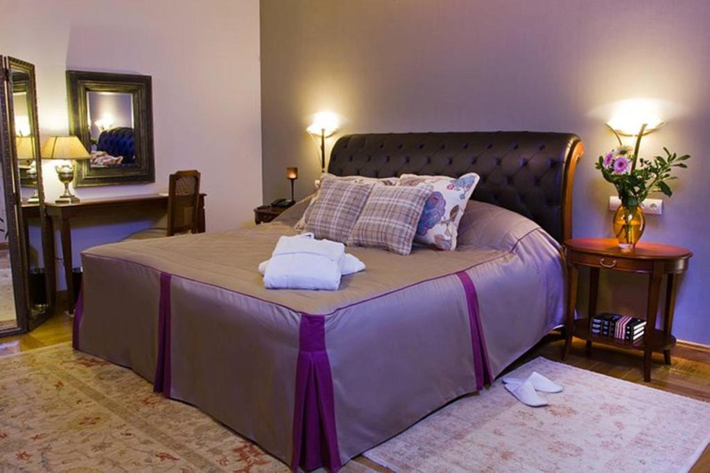 Postel nebo postele na pokoji v ubytování Methexis Boutique Hotel
