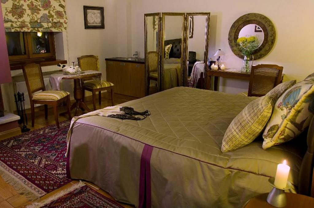 Postel nebo postele na pokoji v ubytování Methexis Boutique Hotel