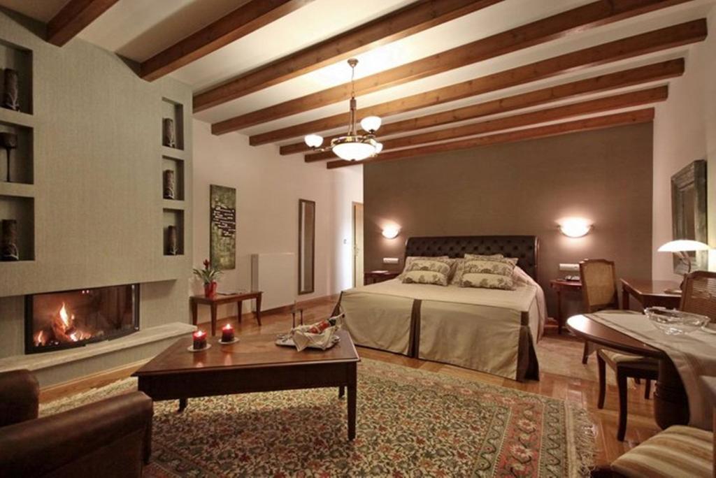 Postel nebo postele na pokoji v ubytování Methexis Boutique Hotel