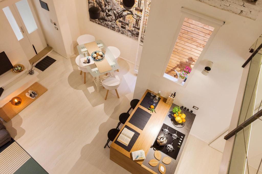 an overhead view of a living room and a dining room at Cavour16 Suite in Siracusa