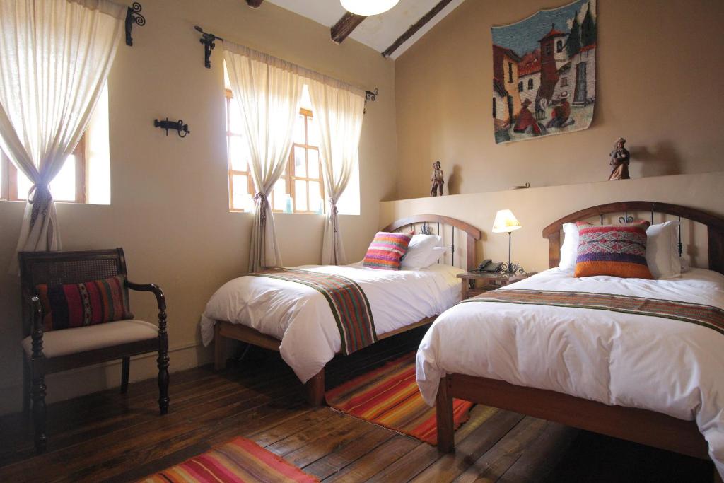 Postel nebo postele na pokoji v ubytování "LLipimpac Guesthouse"
