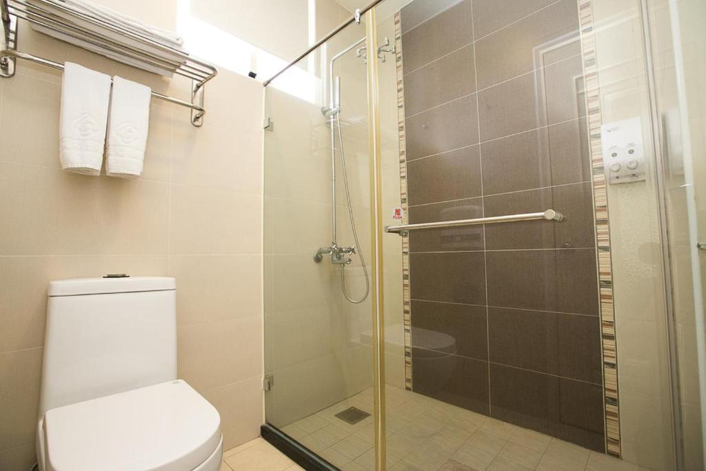 Ein Badezimmer in der Unterkunft 王牌旅館 Ace Hotel