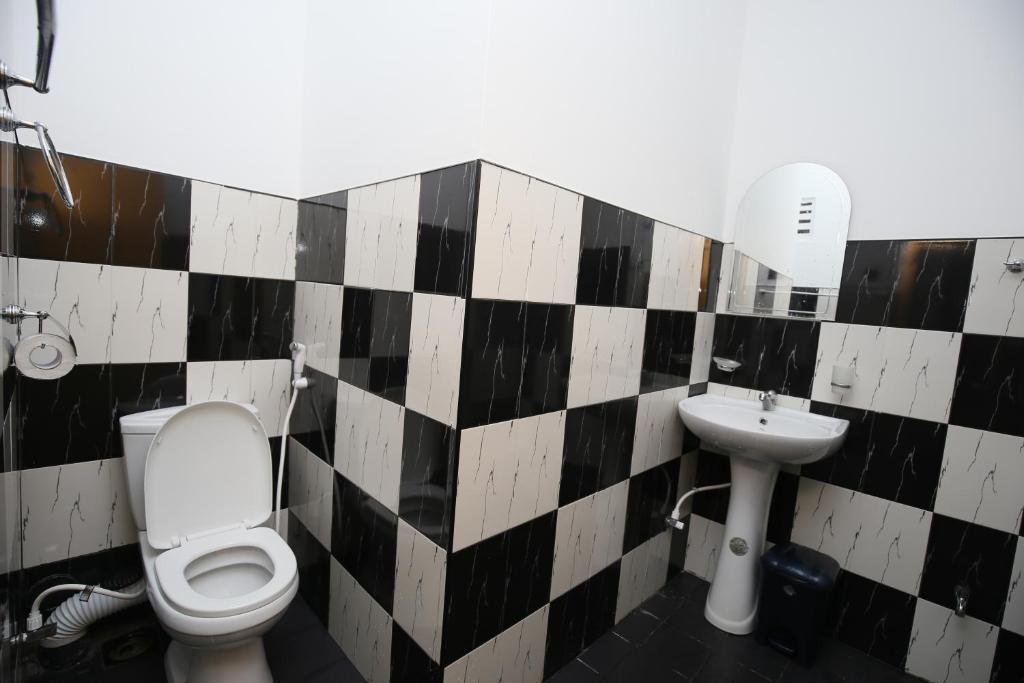 Koupelna v ubytování Isuru Homestay