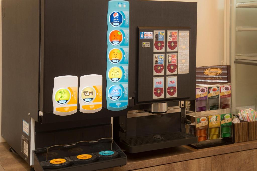 Příslušenství pro přípravu čaje a kávy v ubytování Hotel cooju Fukui