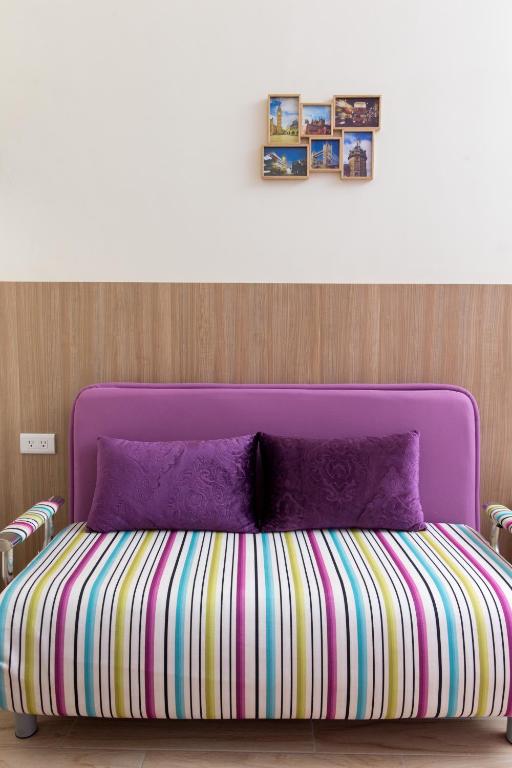 Postel nebo postele na pokoji v ubytování Sanwu Homestay