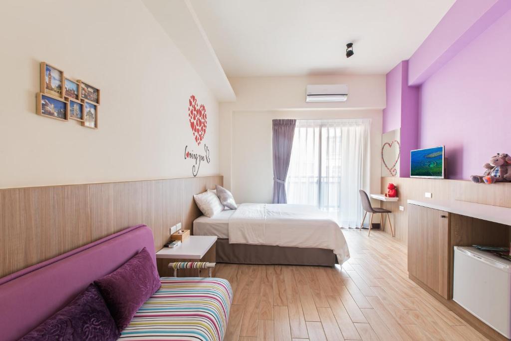 Postel nebo postele na pokoji v ubytování Sanwu Homestay